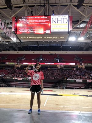 Leslie showing her prize she won during the National History Day Nationals. Picture taken by Kijune Kim.