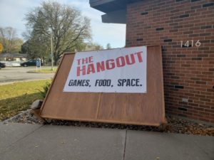 "The Hangout's" main sign, pictured leaning against the side of the Northern Presbyterian Church.